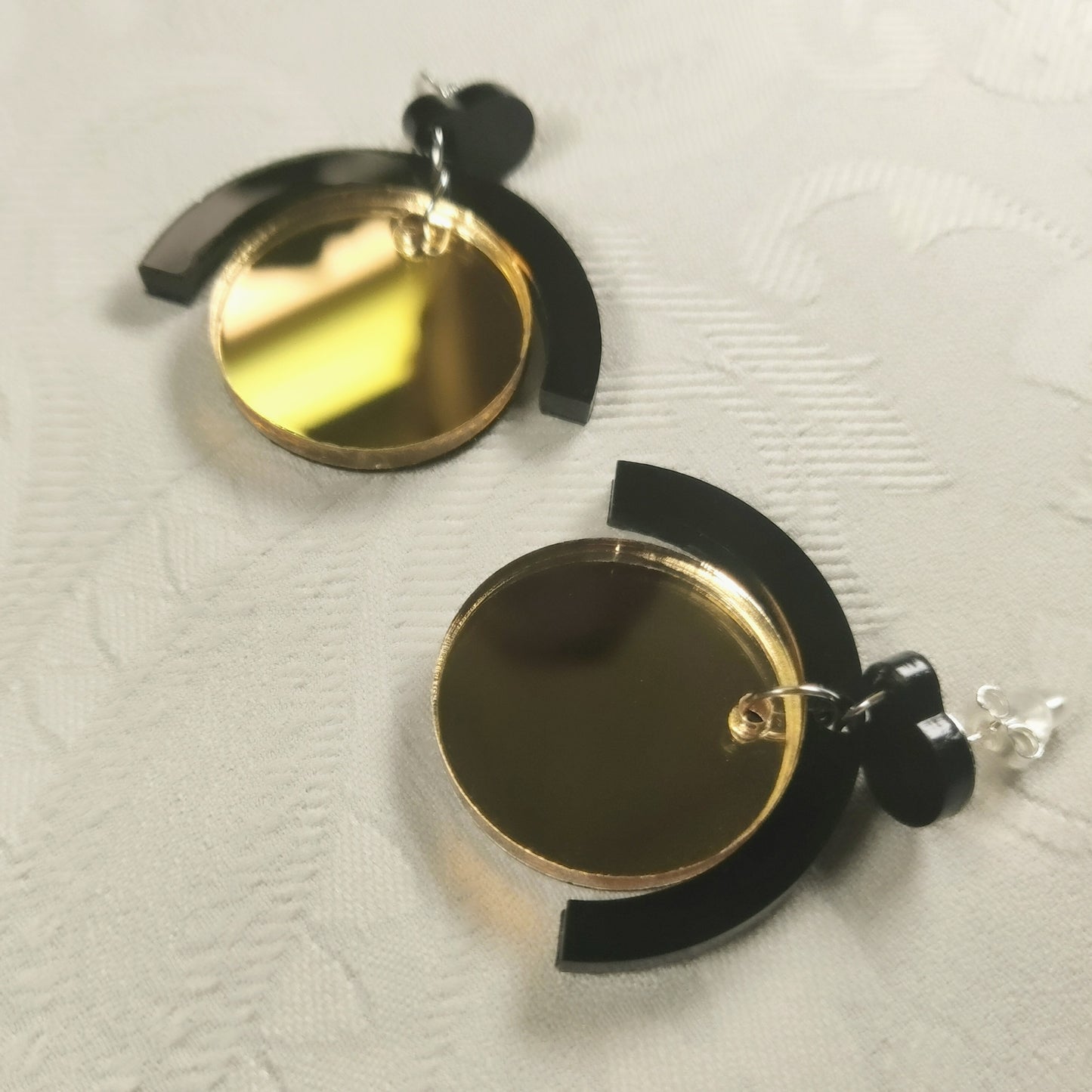 Geometric black and gold circle earrings