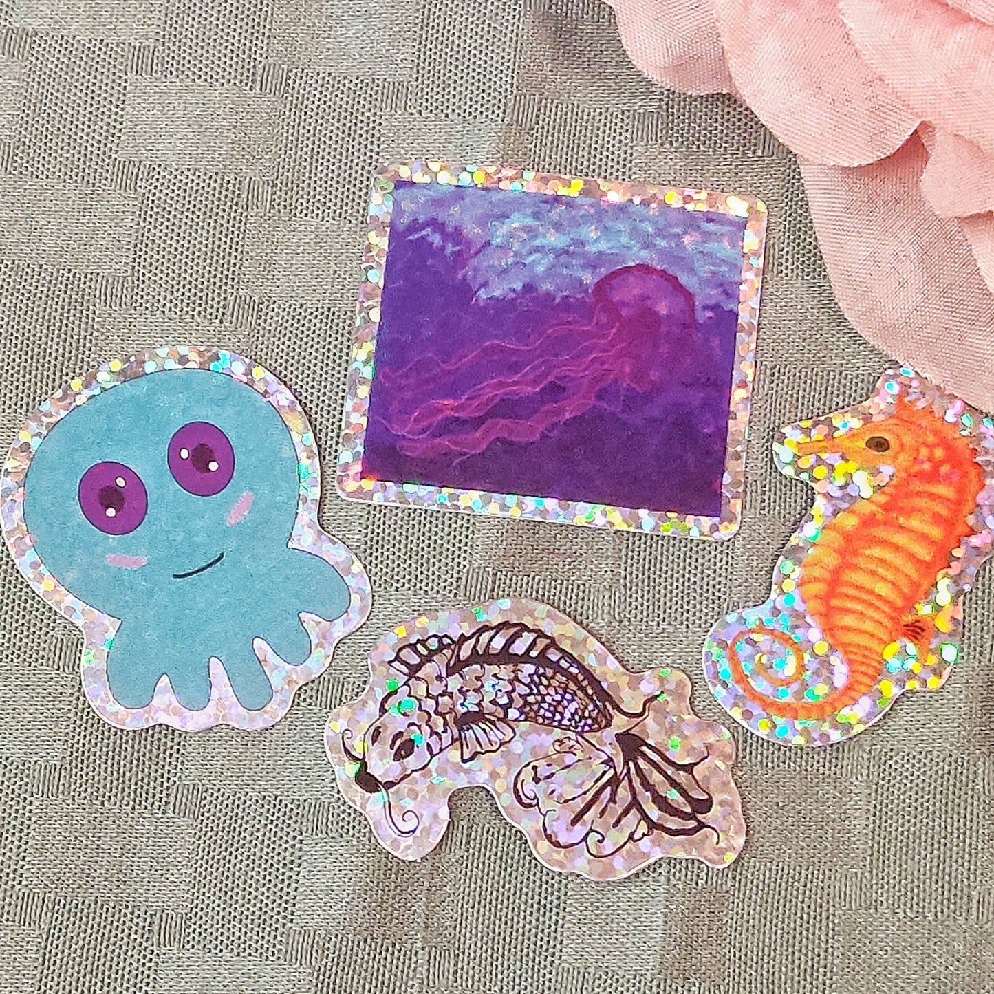 Aquatic creature holographic glitter stickers.