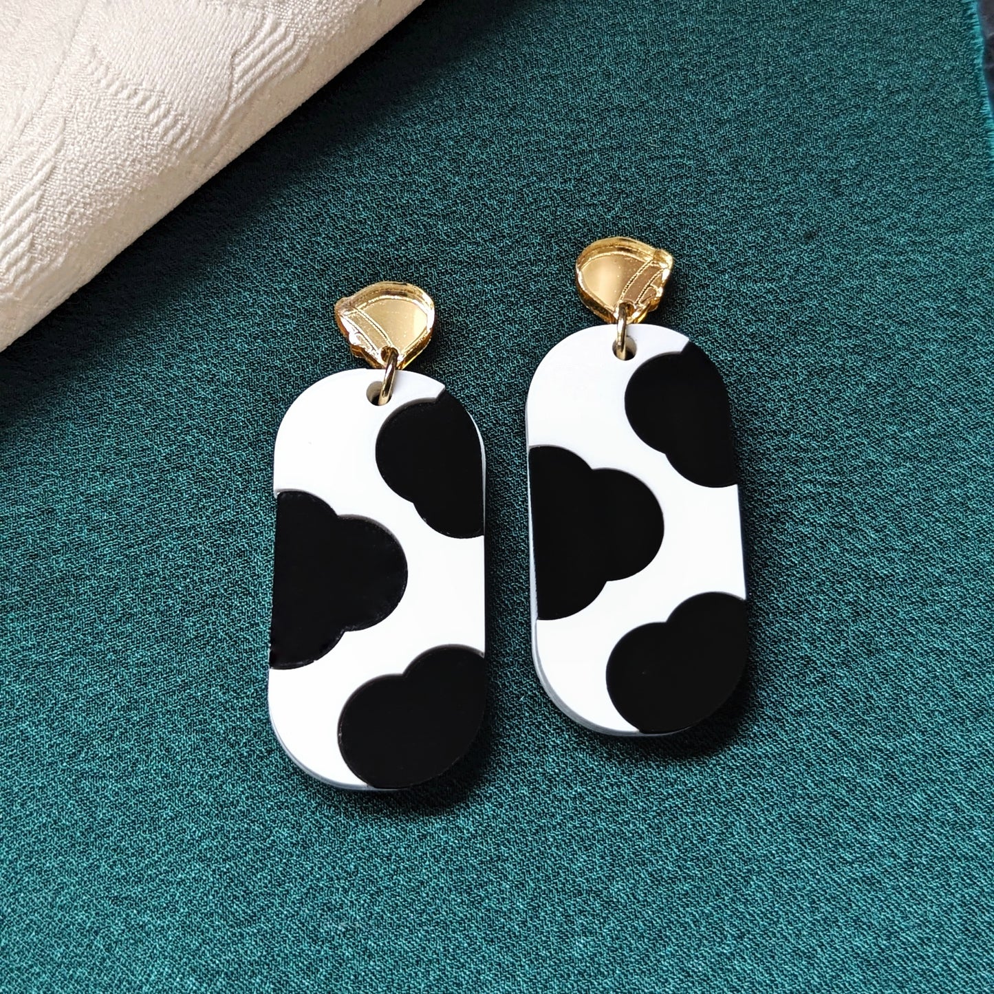 Cow Print Black and White Earrings with Gold Bells