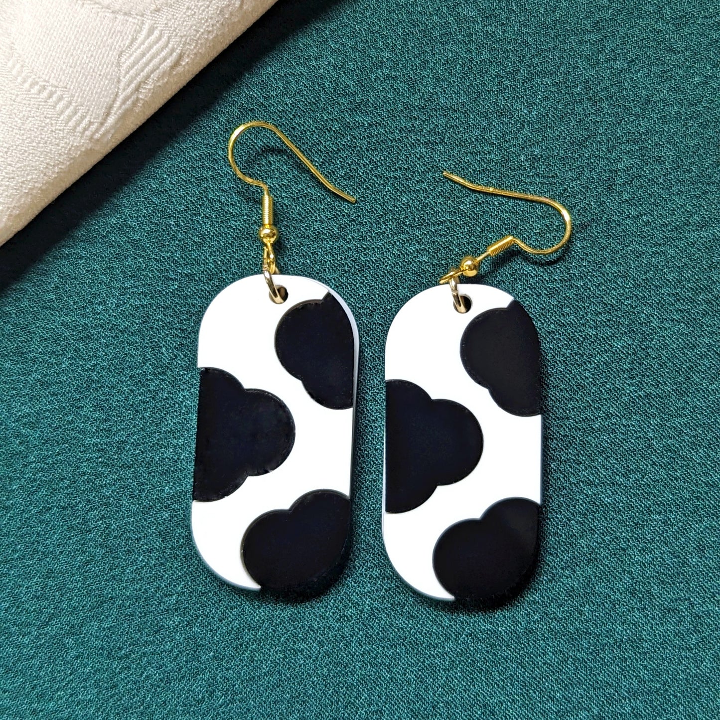 Cow Print Black and White Earrings with Gold Bells