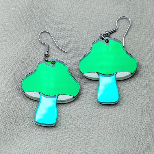Green mushroom earrings made with three different shades of green acrylics on stainless steel fishhooks