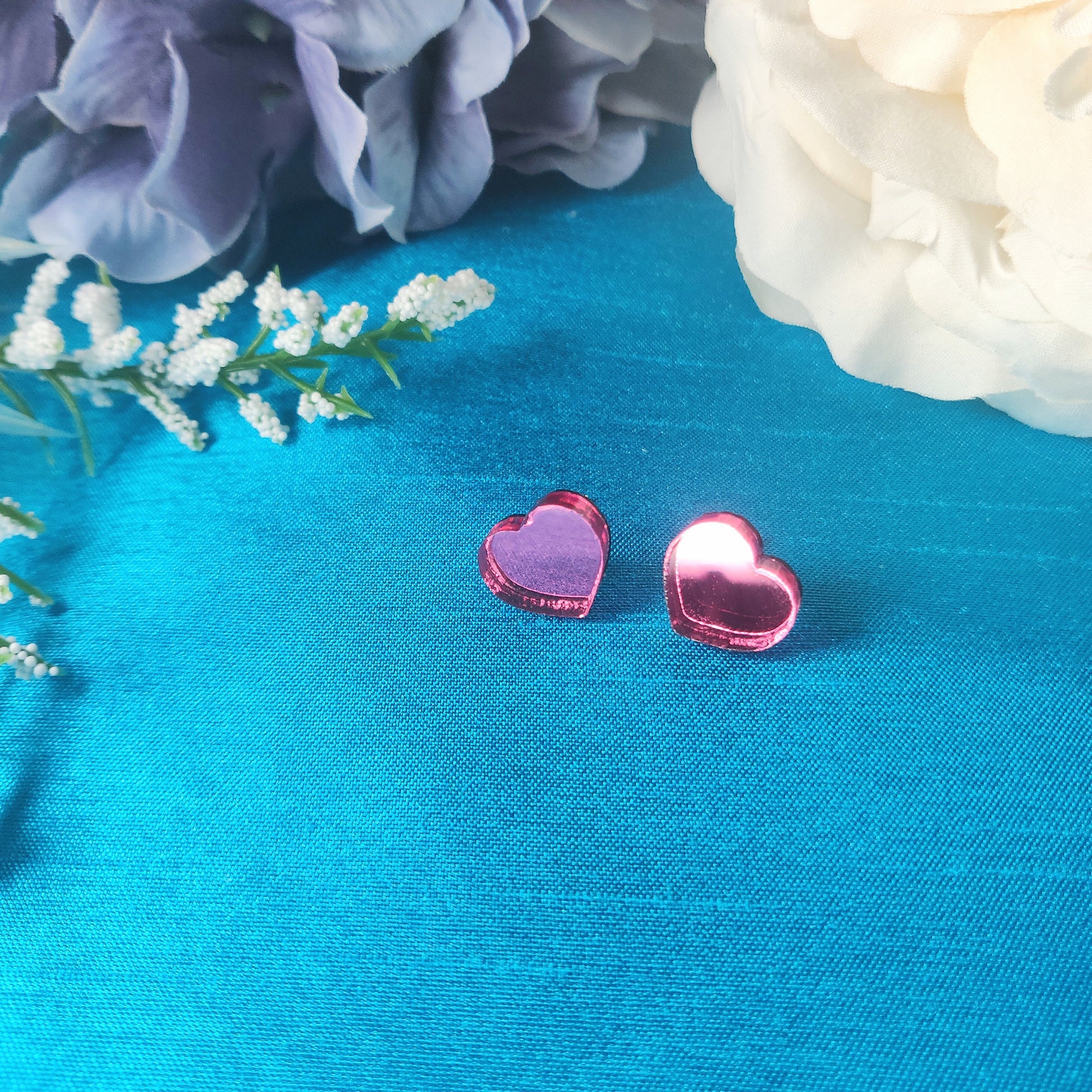 Pink heart studs