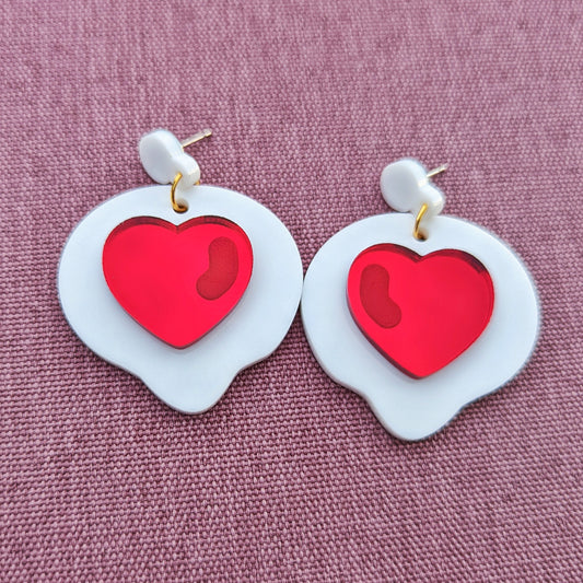 red shiny hearts in white thought bubble earrings