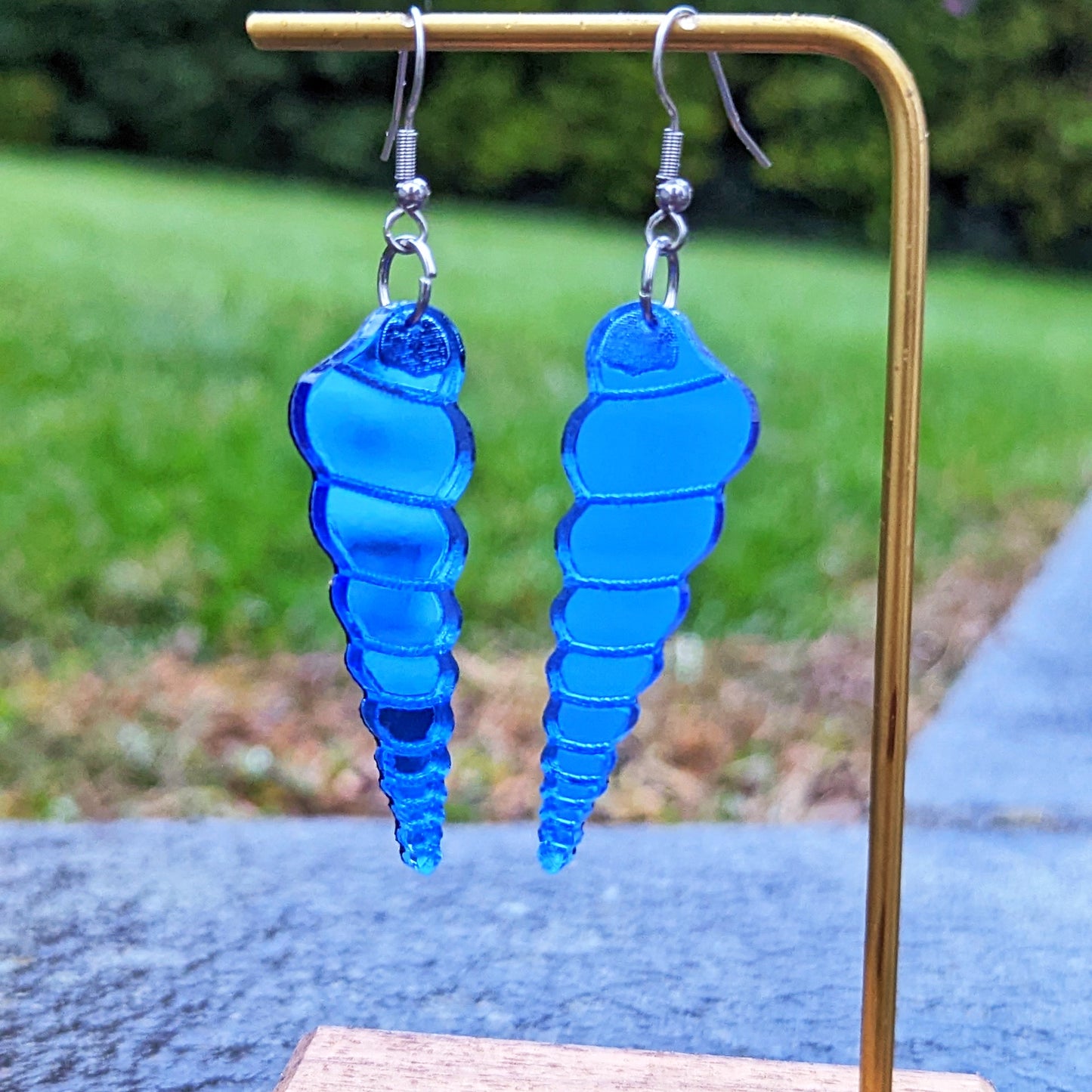 blue long shell in shiny acrylic on stainless steel fishhook earrings.