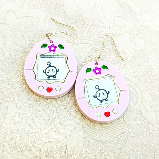 Farming sim themed virtual pet toy imitation earrings.